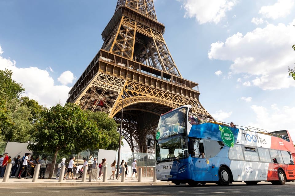 Disneyland Paris: Bus Sightseeing Tour in Paris - Riding with an audio guide (and a real human for questions)