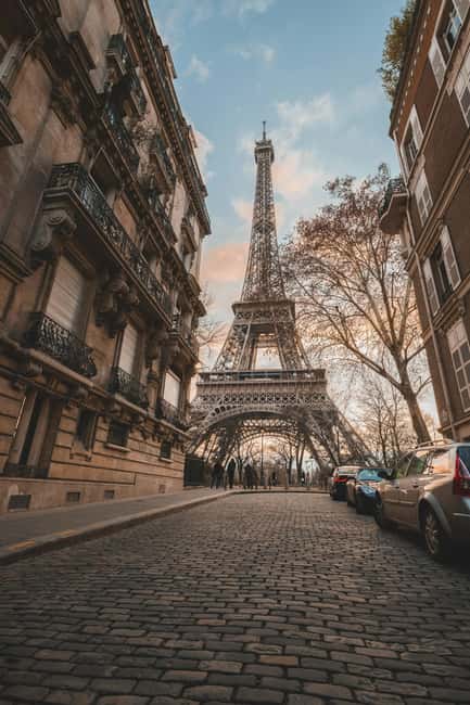 Eiffel Tower Reserved Access with Photoshoot stops - Photo-stop walking: Seine angles that actually help your pictures