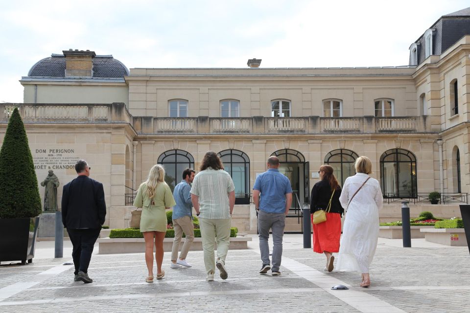 From Paris: Prestige Champagne Tour and Tastings - The prestige Champagne house: cellars, guided tour, and tasting time