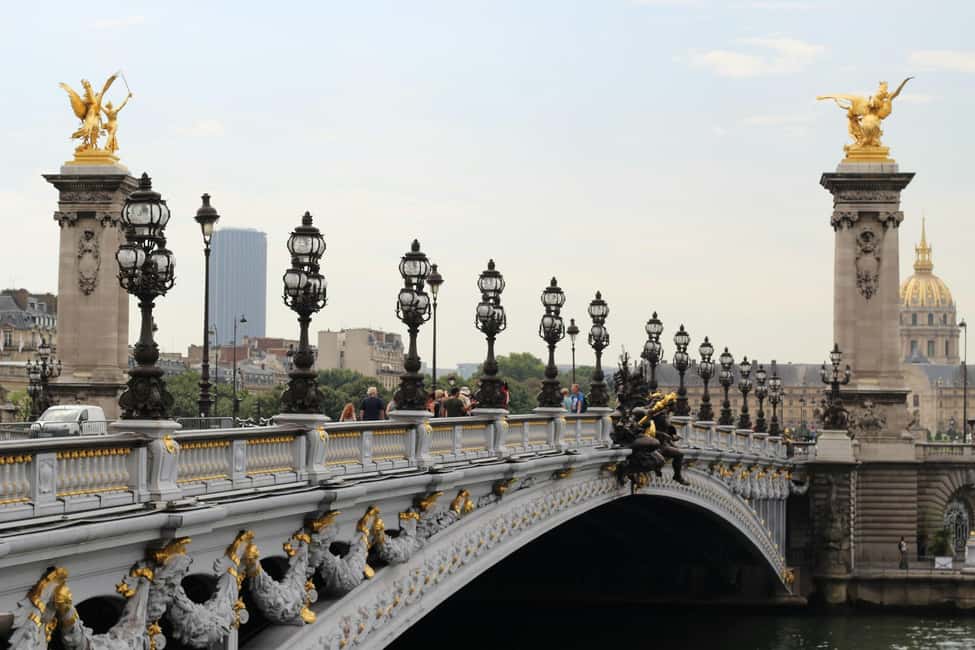 Pairs: The Opera to Hotel des Invalides Guided Walking Tour - Language, accessibility, and who this tour suits