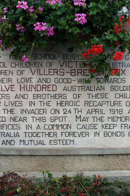 Paris: Anzac Day Day Tour to Villers Bretonneux - The Victoria School connection: a memorial with a personal handshake