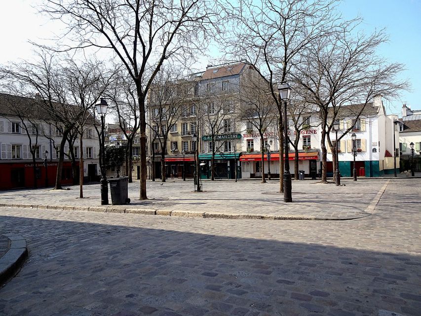 Paris: Charms of Montmartre Guided Walking Tour - Last vineyard in Paris: still producing vino
