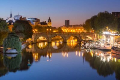 Paris: Ghosts and Dark Stories Guided Walking Tour - Meeting at Pont Neuf: the Henri IV statue and the orange sign