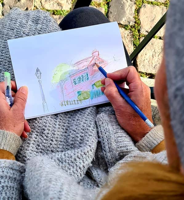 Paris: Montmartre Drawing tour with a local artist - Setting up at Place des Abbesses, with stool and sketchbook ready