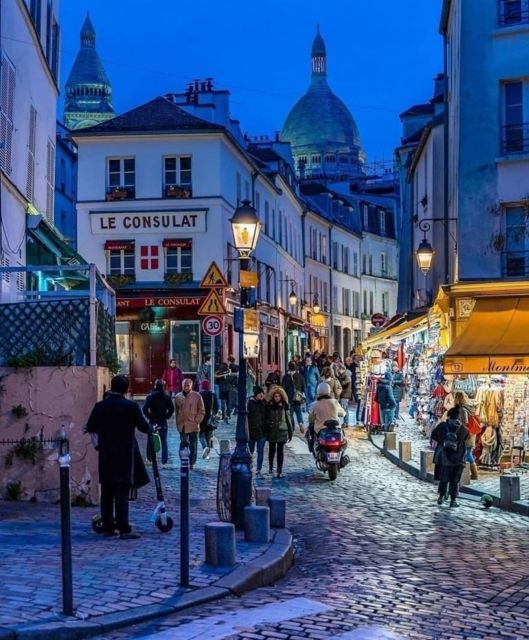 Paris: Montmartre Hill & Sacré-Cœur Guided Walking Tour - The climb through Montmartre: narrow streets, real views, real effort