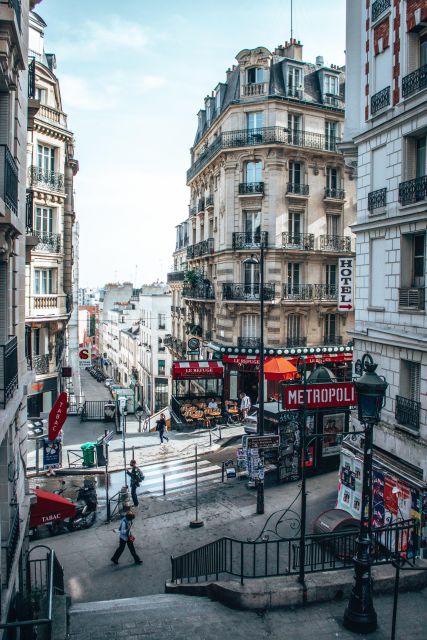 Paris: Montmartre Tour with Local Guide - La Maison Rose, Dalida’s Bust, and Le Lapin Agile