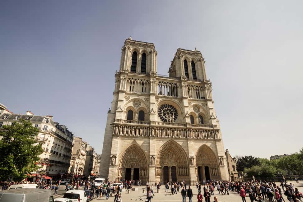 Paris: Notre Dame and Île de la Cité Walking Tour - The island walk: Sainte-Chapelle, Conciergerie, and Hôtel-Dieu