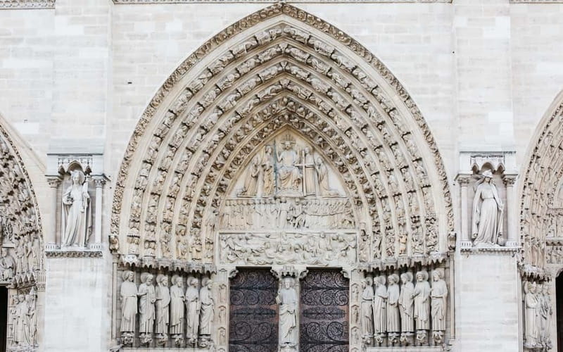 Paris: Notre Dame Exterior Tour with a Small Group - “Nine centuries” isn’t a slogan: how the exterior shows long effort