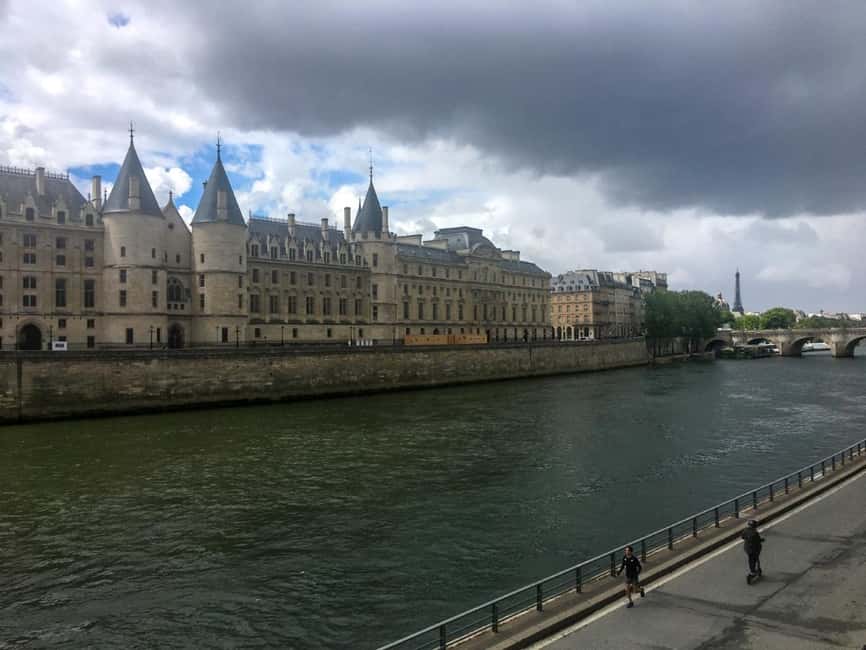 Paris: Notre Dame Exteriors and Ile de la Cité Walking Tour - Saint Michel Fountain photo stop: a small landmark with a lot of story fuel