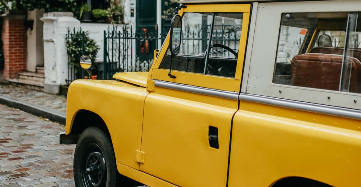 Paris: Private Guided Tour in a vintage Land Rover - Riding a vintage Land Rover through Paris streets