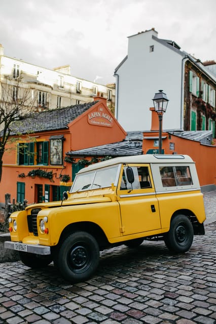 Paris: Private Guided Tour in a vintage Land Rover - The iconic drives: prestigious avenues and the Arc de Triomphe roundabout