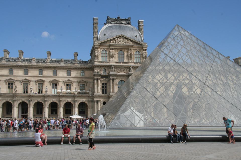 Paris: Private Tour with a Local Guide - Notre-Dame, Eiffel Tower, Louvre, and Arc de Triomphe: seeing icons without losing the plot