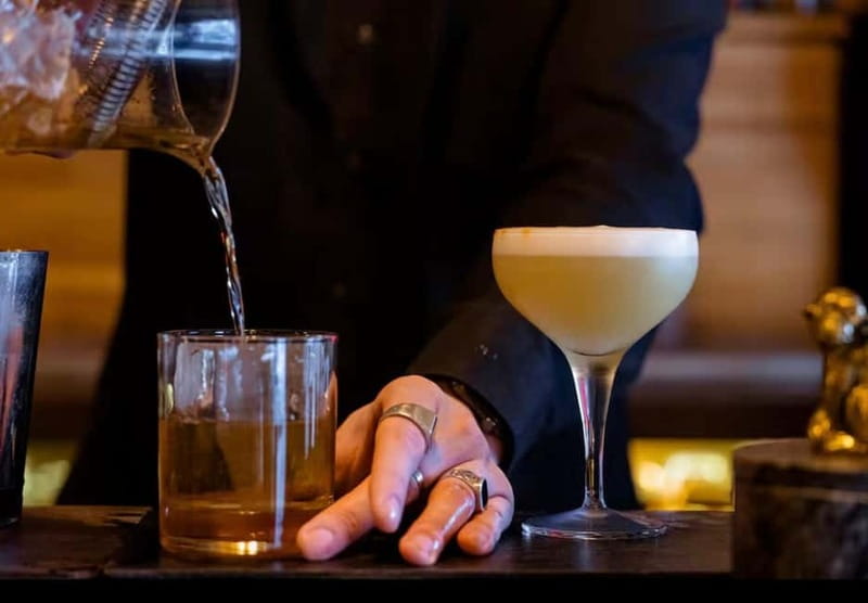 Solo travelers Meetup:A cultural stroll,Drinks & socializing - Games as the Secret Ingredient (Not Just Entertainment)
